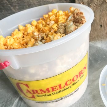Carmelcorn - a bucket of popcorn and a bowl of popcorn - Specialty Food Near Me - Gatlinburg, Tennessee Carmelcorn - a bucket of popcorn and a bowl of popcorn - Specialty Food Near Me - Gatlinburg, Tennessee