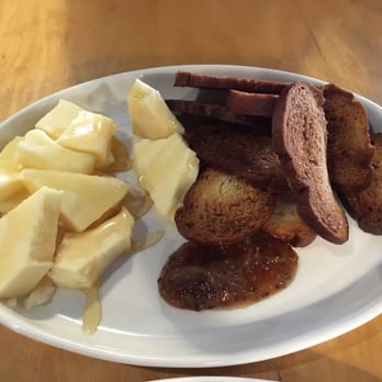 Rooster - Crostini-like crackers with Vermont cheddar covered in local honey and served with apple butter.  Absolutely delicious! - New American Near Me - Newington, Connecticut