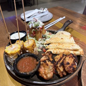 Nacho Daddy - Sampler Platter - Grilled Mexican Corn, Cheesy Quesadilla, Crispy Chicken Taquitos, and Spicy Grilled Wings - Mexican Near Me - Nashville, Tennessee