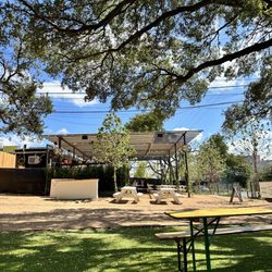 Howdy's - View to other side with taco and coffee food trucks.
