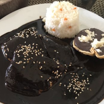 Terra Cotta - Pollo with Oaxacan mole, served with rice pilaf and black beans. - Mexican Near Me - Crucecita, OAX Terra Cotta - Pollo with Oaxacan mole, served with rice pilaf and black beans. - Mexican Near Me - Crucecita, OAX
