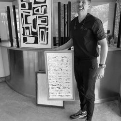 Ron O'Neal, DMD - The Family Dentist - Dr O'Neal with Goatavious Artwork