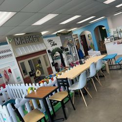Tulsa Play & Cafe - Inside half of Cafe area and play area of an adorable tiny town for kiddos to play for a small free