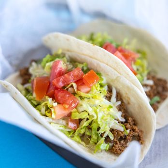 Cantina 76 - two tacos with tomatoes and lettuce - Bars Near Me - Kiawah Island, South Carolina Cantina 76 - two tacos with tomatoes and lettuce - Bars Near Me - Kiawah Island, South Carolina