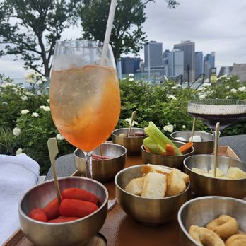QC Spa - My aperol spritz and aperitivo tray, poolside - Massage Near Me - New York, New York QC Spa - My aperol spritz and aperitivo tray, poolside - Massage Near Me - New York, New York