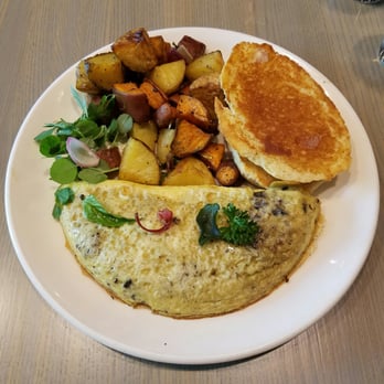 Nicks On Broadway - Omelette with home fries and buttermilk biscuits - New American Near Me - Providence, Rhode Island Nicks On Broadway - Omelette with home fries and buttermilk biscuits - New American Near Me - Providence, Rhode Island