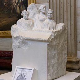 Statue for women's rights, with a spot symbolizes that the fight is not finished just yet. Statue for women's rights, with a spot symbolizes that the fight is not finished just yet.