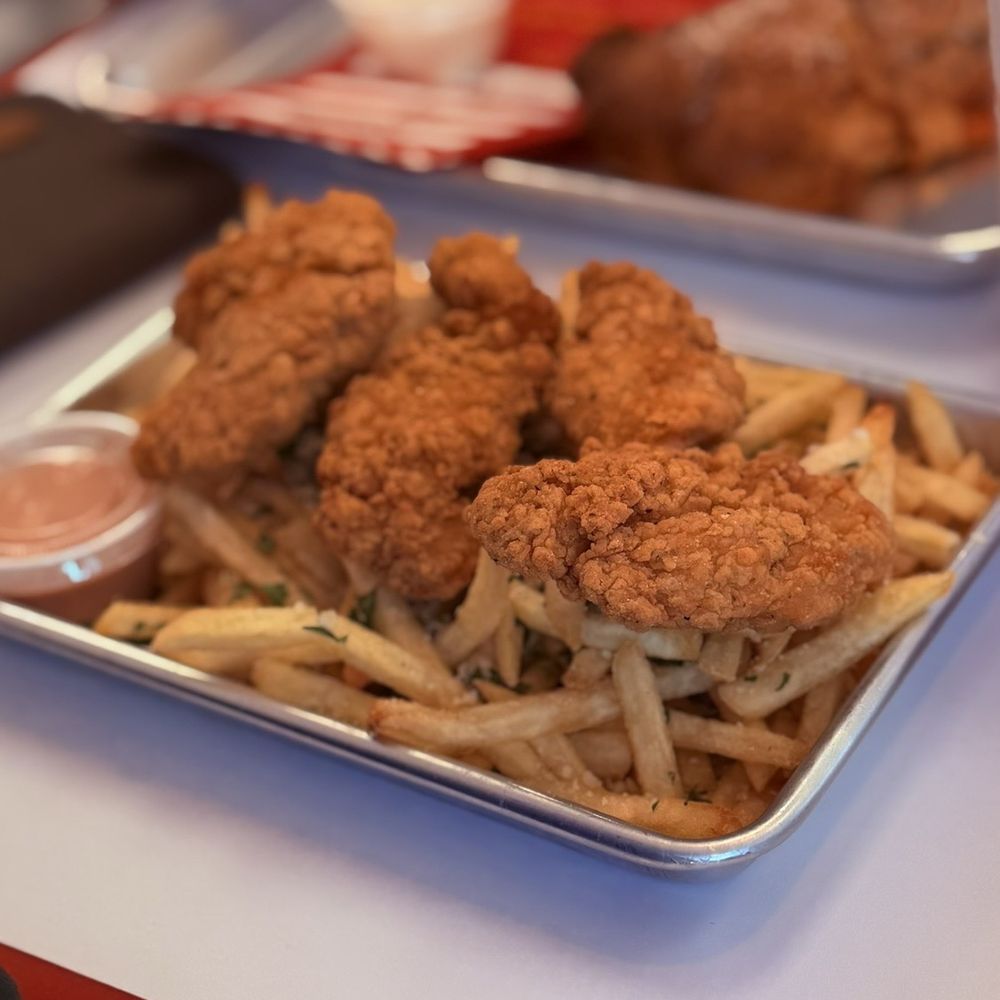 Chicken tenders and garlic fries Chicken tenders and garlic fries