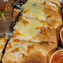 Golden Pizza - Cheap ingredients. Dough was rough and cheese was rubber