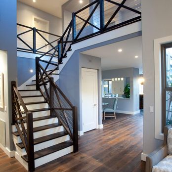 Collom Construction - Remodeled staircase with steel cables part of full house remodel - General Contractors Near Me - La Mesa, California Collom Construction - Remodeled staircase with steel cables part of full house remodel - General Contractors Near Me - La Mesa, California