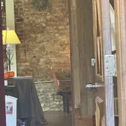 Blissful Brew - A room with 50's style booths and game tables.