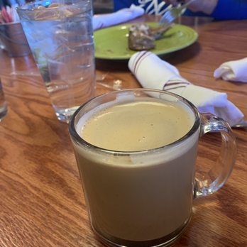 The Range Cafe - Dirty Chai but if you squint you can see the remnants of a cinnamon roll in the back. Lol - Mexican Near Me - Albuquerque, New Mexico