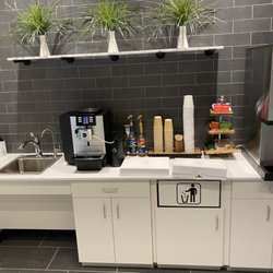 Razor's Edge Barber Shop - Coffee bar in waiting area.