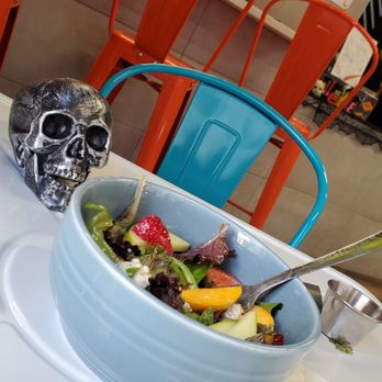 Cheezus - a bowl of salad and a skull - Desserts Near Me - El Paso, Texas