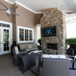 Pro AV Home Theater - Outdoor TV mounted in a covered patio, controlled by Control4