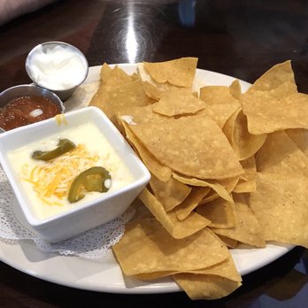 Sidelines Grille - Chips and queso - Sports Bars Near Me - Woodstock, Georgia Sidelines Grille - Chips and queso - Sports Bars Near Me - Woodstock, Georgia