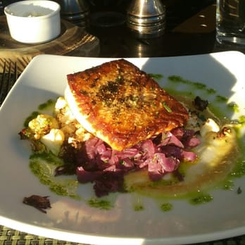 Cedric's Tavern - Cast Iron Seared Scottish Salmon w/ braised red cabbage, charred cauliflower, leek & fennel cream - Pubs Near Me - Asheville, North Carolina