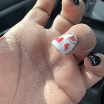 Ava Nails Spa - Lifted sticker decals , then tried  to use the gel polish to even the surface of the bumpy stickers .NEVER AGAIN - Waxing Near Me - Charlotte, North Carolina