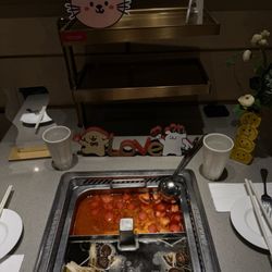 Haidilao Hot Pot - Tomato and mushroom broth