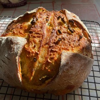 Flour Hands Bakery - Jalapeno Cheese sourdough loaf with pickled jalapenos & Tillamook sharp cheddar - Bakeries Near Me Flour Hands Bakery - Jalapeno Cheese sourdough loaf with pickled jalapenos & Tillamook sharp cheddar - Bakeries Near Me