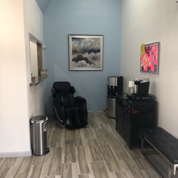 Prestige Chiropractic - Massage chairs an coffee bar in lobby