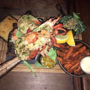 Grinder - PLATEAU SURF & TURF, lobster, shrimps and TOMAHAWK RIB STEAK DRY AGED 40 DAYS, with SWEET POTATOES FRIES & MAYO and POTATOES "ALIGOT" - Steakhouses Near Me - Montreal, Quebec