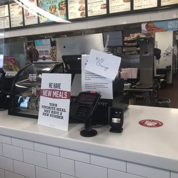 Arby's - a sign on the counter of a restaurant - Fast Food Near Me - Marianna, Florida