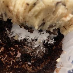 757 Pastries & More - Chocolate cupcake with marshmallow filling and cookie dough frosting inside photo