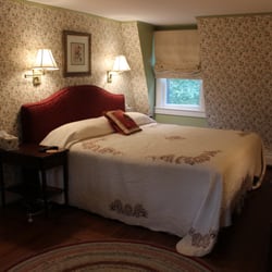 The House on Main Street - The Rose Room has a king bed and a day bed.