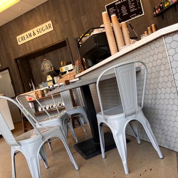 Cream & Sugar - a counter and chairs in a coffee shop - Coffee & Tea Near Me - Fairview, Texas