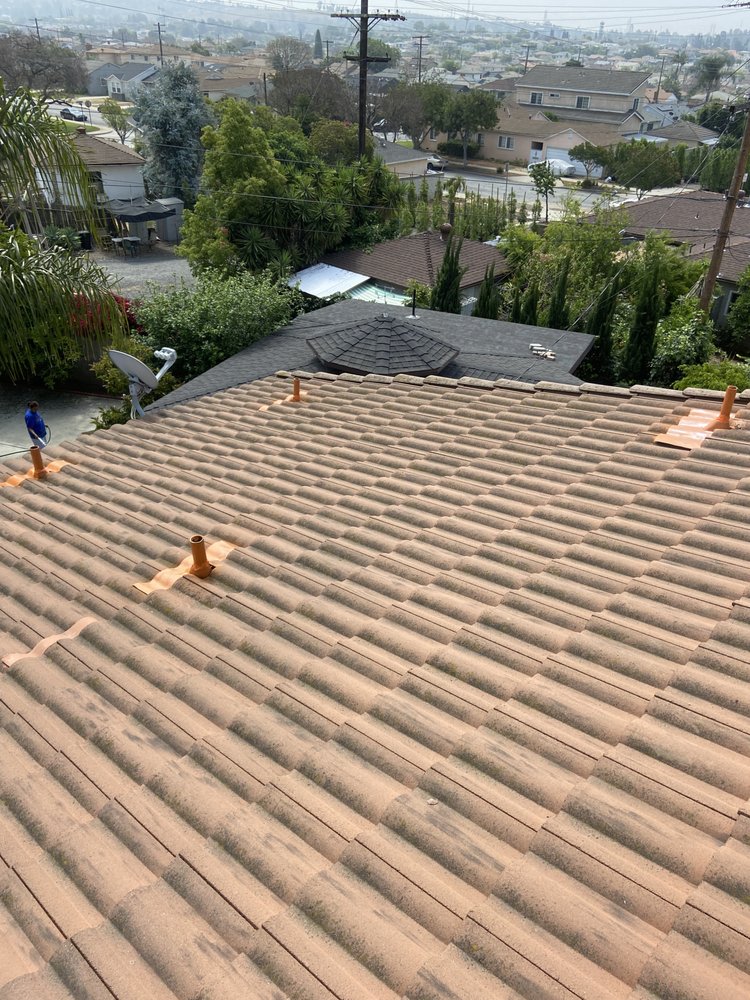 Slide of Mencho's Roofing & Repairs