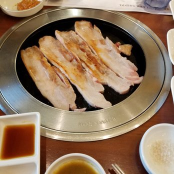 Hahm Ji Bach - Thick pork belly on stone grill. - Korean Near Me - Flushing, New York Hahm Ji Bach - Thick pork belly on stone grill. - Korean Near Me - Flushing, New York