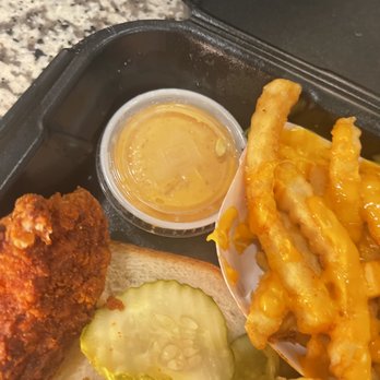Dave's Hot Chicken - Their sauce was yummy, hiding under the pickles - Chicken Shop Near Me - Menifee, California