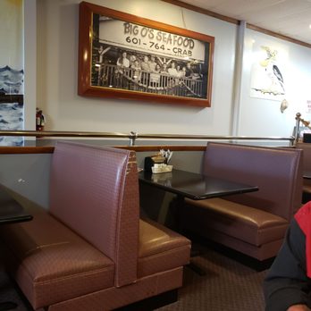 Big O's Seafood - a man sitting in a booth - Seafood Near Me - Bay Springs, Mississippi