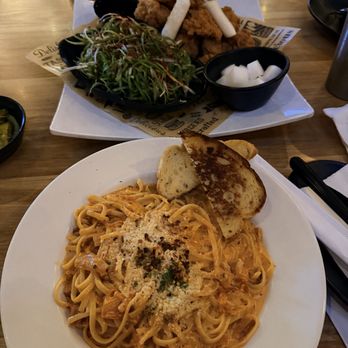 Anju House - kimchi bacon pasta and OG fried chicken with (bomb) onion leek salad - Korean Near Me - Los Angeles, California