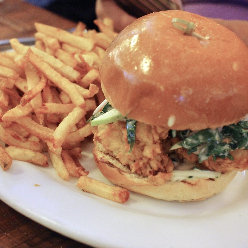 The Smith - spicy fried chicken sandwich with kale & green apple slaw, lemon tartar, buttered brioche ($16) - New American Near Me - Washington, DC, District of Columbia The Smith - spicy fried chicken sandwich with kale & green apple slaw, lemon tartar, buttered brioche ($16) - New American Near Me - Washington, DC, District of Columbia