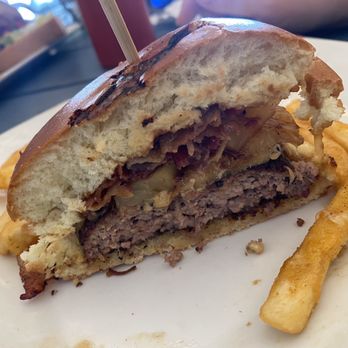 The Lazy Lizard - Inside of burger to show great size of Pattie, huge bacon serving and pineapple - Bars Near Me - Hernando Beach, Florida