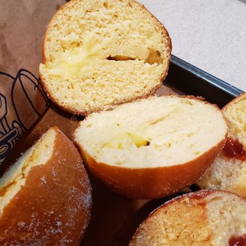 Bob's Donuts - Custard malasadas. This one had the most generous amount of filling of each type we got. $14 for 4, not worth it. - Donuts Near Me - San Francisco, California