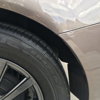 Legacy Auto Detailing - Tires not too shiny but enough to stand out. You can't see here but there were some water spots on the rims and lower parts of the car. - Auto Detailing Near Me