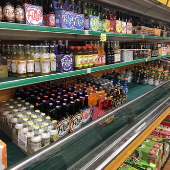 Chops, Cheese, and Chives - a refrigerated section of a grocery store - Meat Shops Near Me - Covington, Kentucky Chops, Cheese, and Chives - a refrigerated section of a grocery store - Meat Shops Near Me - Covington, Kentucky