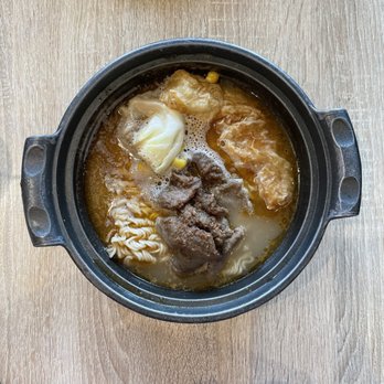 Cafe De Hong Kong - Clay pot satay beef instant noodle in soup w/fish spring roll. - Hong Kong Style Cafe Near Me - Markham, Ontario
