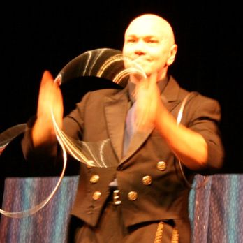 Mike Ching Magic - Spinning Rings; many of the skill effects in the show have taken years to master - Magicians Near Me - Honolulu, Hawaii Mike Ching Magic - Spinning Rings; many of the skill effects in the show have taken years to master - Magicians Near Me - Honolulu, Hawaii
