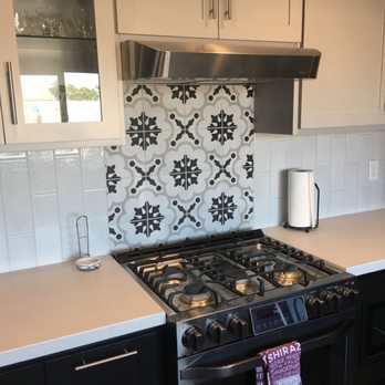 Central Coast Marble & Granite - Two different tiles installed and they did an amazing job maximizing the space behind the stove to make my stove the focal point! - General Contractors Near Me - Santa Maria, California