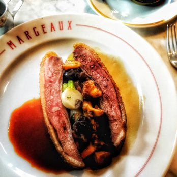Brass Tack - Duck with cognac sauce, chanterelles, and cherries - American Near Me - Chicago, Illinois
