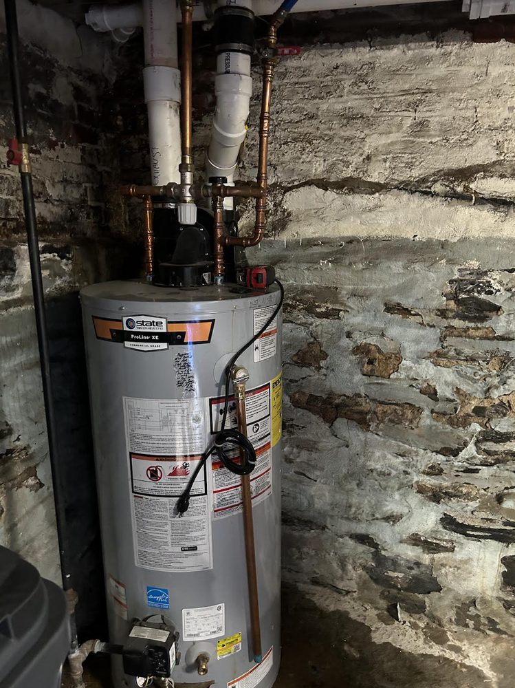 Slide of Imax Plumbing Corporation