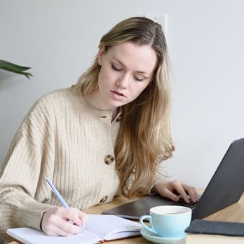 ExtraCredit - Online Math Tutoring - A student taking notes and studying with her tutor online. - Private Tutors Near Me ExtraCredit - Online Math Tutoring - A student taking notes and studying with her tutor online. - Private Tutors Near Me