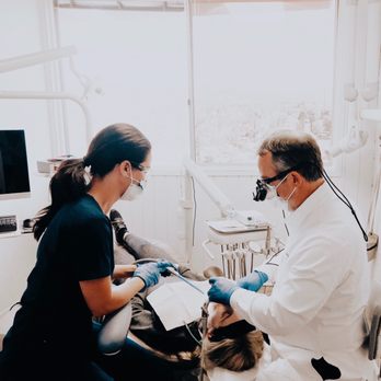 Michael T. Frickman, DDS - Dr. Frickman fixing a cavity in a patients mouth. - Oral Surgeons Near Me - Escondido, California Michael T. Frickman, DDS - Dr. Frickman fixing a cavity in a patients mouth. - Oral Surgeons Near Me - Escondido, California