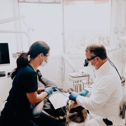 Michael T. Frickman, DDS - Dr. Frickman fixing a cavity in a patients mouth.