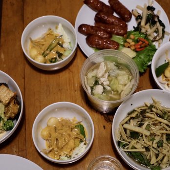 Yasotorn Thai Cusine - Takeout, from Left: Chu Chee Curry with tofu, fish ball soup, Thai sausage appetizer kang omm, and bamboo salad. - Thai Near Me - Evanston, Illinois