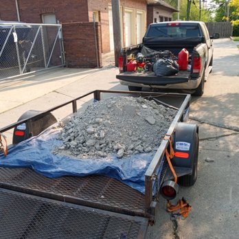 C.L.S. Lawn Care Services - a trailer loaded with gravel - Lawn Services Near Me C.L.S. Lawn Care Services - a trailer loaded with gravel - Lawn Services Near Me